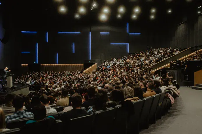 A full auditorium during a conference session