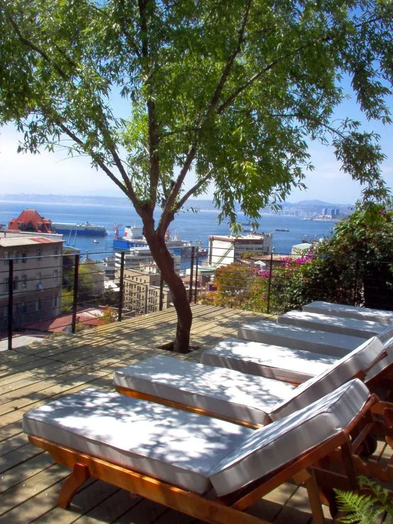 A terrace with loungers overlooking the bay of Valparaíso